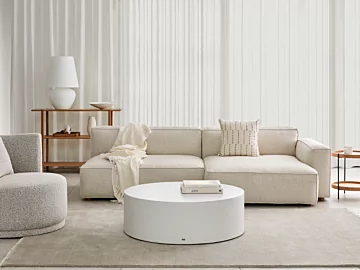 Blinde Design Circ 40 concrete coffee table anchors a private living room, offering a sleek round centrepiece for contemporary interior style.